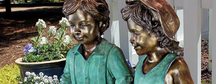 bronze children statues